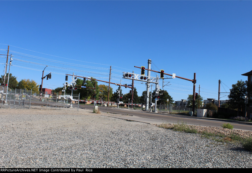 Light Rail And Train Crossing 